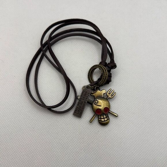 NWOT Skull and crossbones pendant on leather cord - Picture 1 of 6